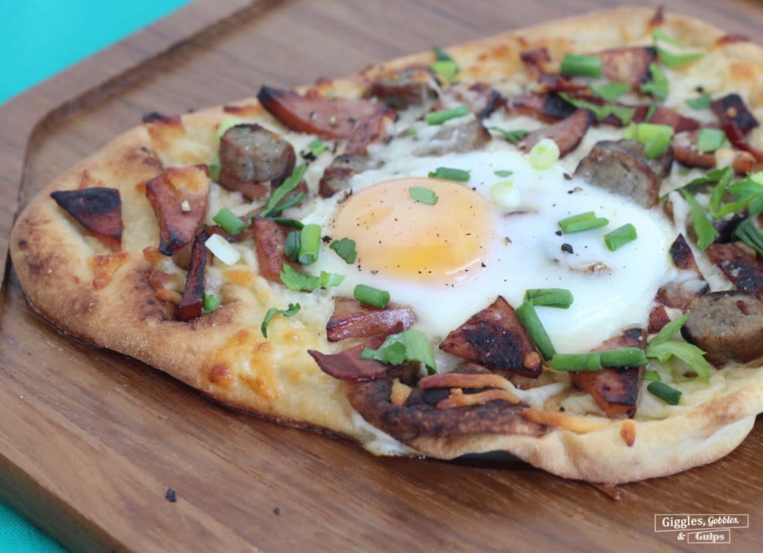 <p>The best of both worlds—breakfast and pizza.</p><p><strong>Get the recipe: </strong><a href="http://gigglesgobblesandgulps.com/breakfast-naan-pizza/" rel="nofollow noopener" target="_blank" data-ylk="slk:Breakfast Naan Pizza;elm:context_link;itc:0;sec:content-canvas" class="link rapid-noclick-resp"><strong>Breakfast Naan Pizza</strong></a></p>