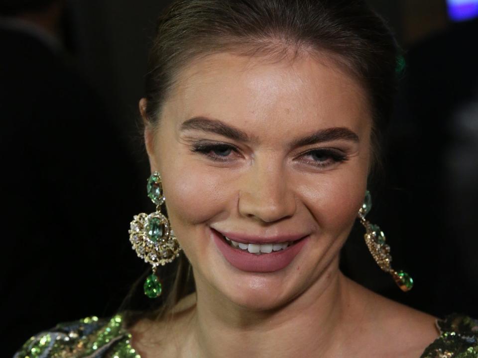 Alina Kabaeva, smiling and wearing a sequinned dress, at Bolshoi Theatre in Moscow, Russia, July,14,2018.