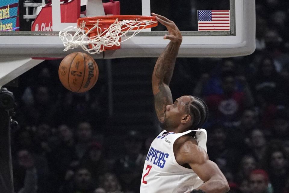 Clippers forward Kawhi Leonard dunks during the first half against the Atlanta Hawks.