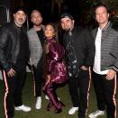<p>*NSYNC's Joey Fatone, Lance Bass, Chris Kirkpatrick, and JC Chasez perform with Ariana Grande at Coachella on April 14, 2019.</p>
