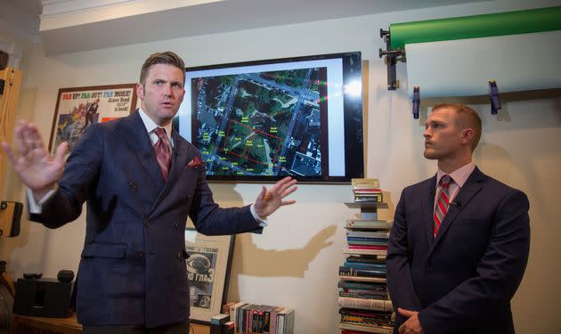 Identity Evropa founder Nathan Damigo, right, holds a press conference with white supremacist Richard Spencer, left, on August 14, 2017, two days after the violent 