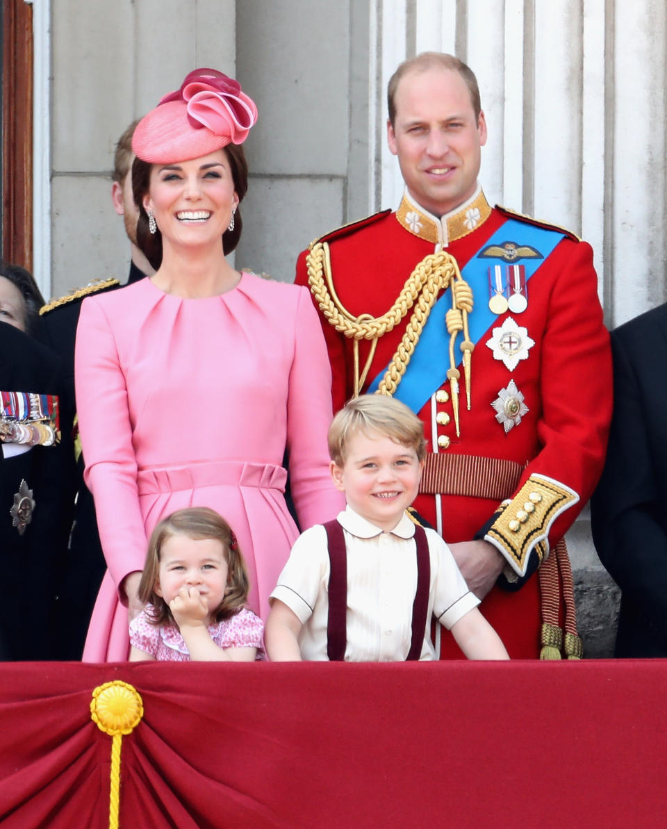 <p>To mark Princess Charlotte’s second Trooping the Colour appearance, she wore a pink floral smock dress while George was dressed in burgundy-hued braces. <em>[Photo: Getty]</em> </p>