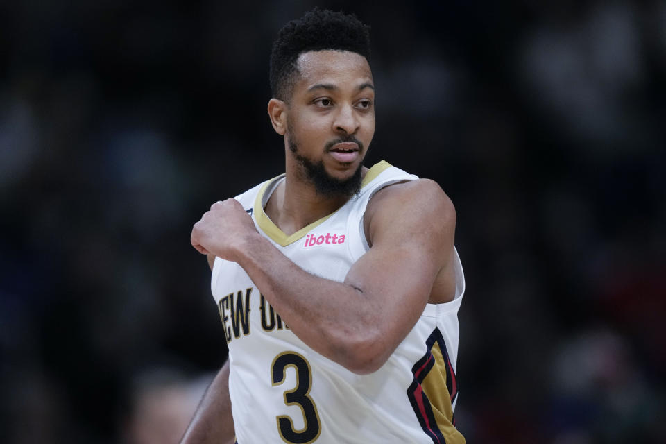 New Orleans Pelicans guard CJ McCollum (3) reacts after making a 3-point basket in the second half of an NBA basketball game against the San Antonio Spurs in New Orleans, Thursday, Dec. 22, 2022. The Pelicans won 126-117. (AP Photo/Gerald Herbert)