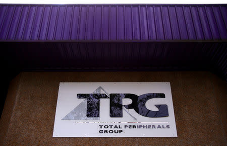 FILE PHOTO - The logo of Australia's TPG Telecom Ltd can be seen outside their head office in Sydney, Australia, April 12, 2017. REUTERS/David Gray/File Photo