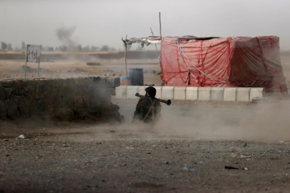 An Afghan soldier fires a rocket-propelled grenade in a clash close to Spin Boldak in Kandahar province, Afghanistan, July 16, 2021. This is the last known photograph by Reuters journalist Danish Siddiqui, who was killed on the same day.  / Credit: DANISH SIDDIQUI / REUTERS