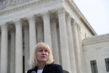 Sheri Lynn Johnson of the Cornell University Death Penalty Project, who represents Curtis Flowers, speaks to the news media outside of the U.S. Supreme Court building in Washington, U.S., March 20, 2019. REUTERS/Leah Millis