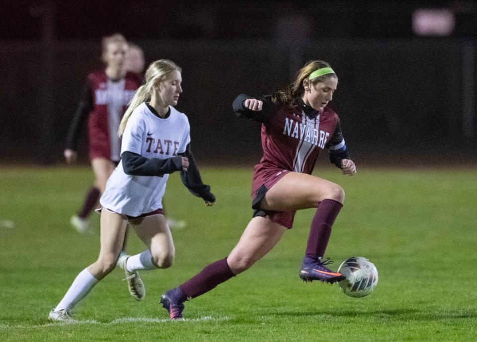 Katie Kauth (15) controls the ball during the Tate vs Navarre girls soccer game at Navarre High School on Wednesday, Jan. 3, 2024.