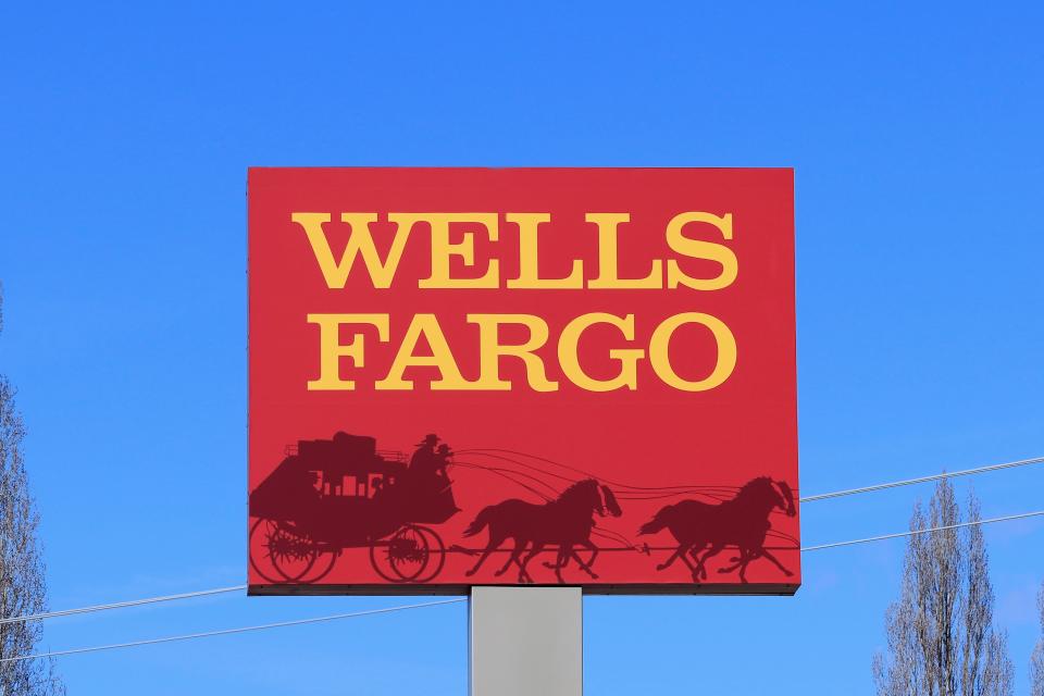 Wells Fargo Bank sign with stagecoach logo, northern Idaho. (Photo by: Don & Melinda Crawford/Education Images/Universal Images Group via Getty Images)