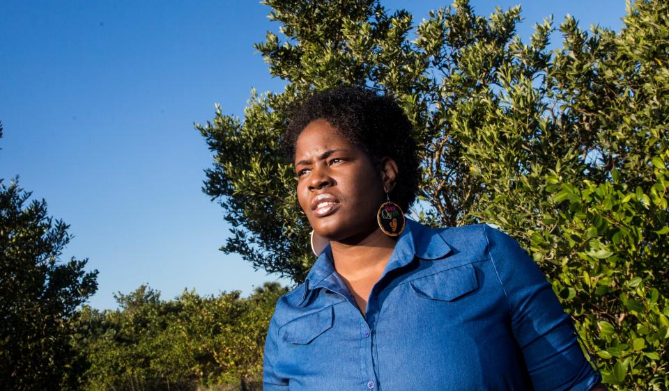 Heather Taylor stands for a portrait at Lovers Key State Park on Fort Myers Beach. She has called out racism on the force and spoken about white officers beating and even shooting their fellow Black officers.