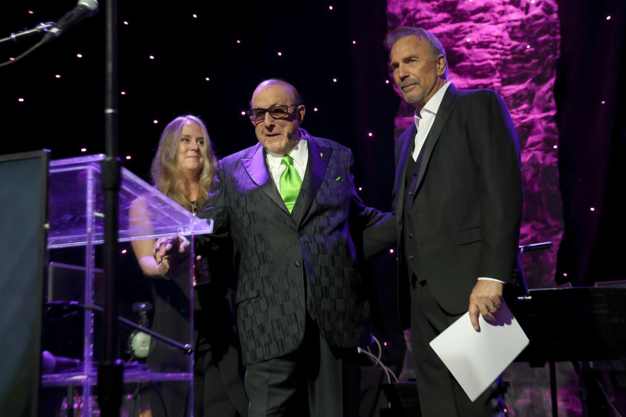 Clive Davis and Kevin Costner speak onstage during the Pre-GRAMMY Gala & GRAMMY Salute to Industry Icons Honoring Julie Greenwald and Craig Kallman on Feb.4, 2023 in Los Angeles, Calif. (Photo: Johnny Nunez/Getty Images for The Recording Academy)