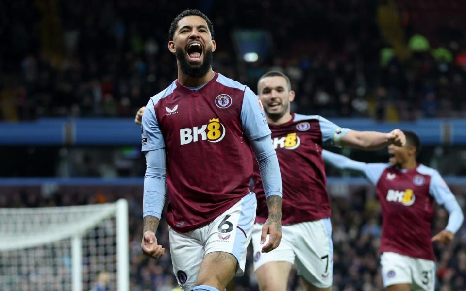 Douglas Luiz of Aston Villa celebrates his goal during the Premier League match between Aston Villa and Burnley FC at Villa Park on December 30, 2023 in Birmingham, England