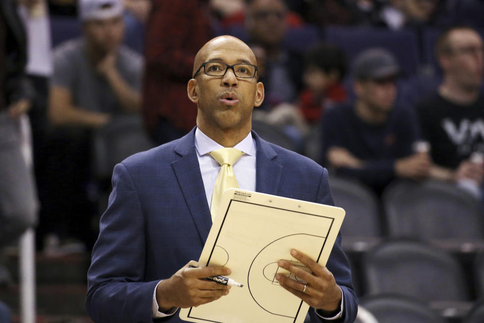 Phoenix Suns head coach Monty Williams pauses near the bench during the second half of an NBA basketball game against the Memphis Grizzlies, Wednesday, Dec. 11, 2019, in Phoenix. The Grizzlies defeated the Suns 115-108. (AP Photo/Ross D. Franklin)