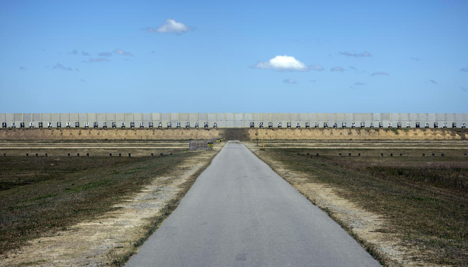 Marine Corps Recruiting Depot's new rifle ranges feature raised shooting platforms and concrete walls on three sides, Wednesday, May 11, 2022, in Parris Island, S.C. The threat of rising seas is encroaching upon one of America's most storied military installations, where thousands of recruits are molded into Marines each year. (AP Photo/Stephen B. Morton)