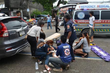 Injured people receive first aid after a bomb exploded on August 11, 2016 in Trang, Thailand. Picture taken August 11, 2016. Dailynews via REUTERS