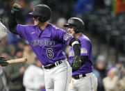 Colorado Rockies' Brian Serven (6) celebrates after hitting a two-run home run against the New York Mets in the sixth inning of the second baseball game of a doubleheader Saturday, May 21 2022, in Denver. (AP Photo/David Zalubowski)