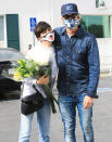 <p>Selma Blair receives a large bouquet of flowers from boyfriend Ron Carlson at Bristol Farms in L.A. on Sunday.</p>