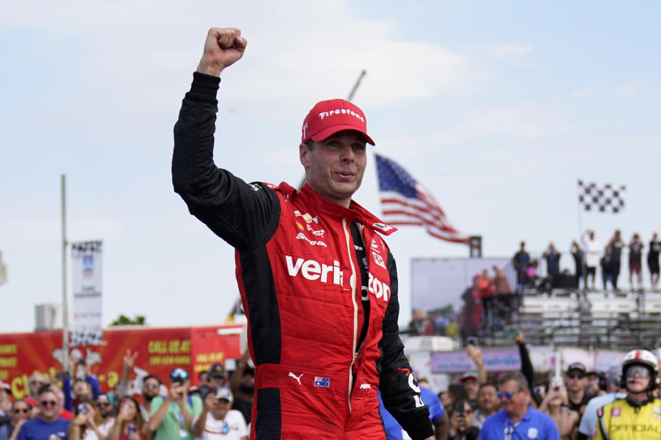 Will Power celebrates winning the IndyCar Detroit Grand Prix auto race on Belle Isle in Detroit, Sunday, June 5, 2022. (AP Photo/Paul Sancya)