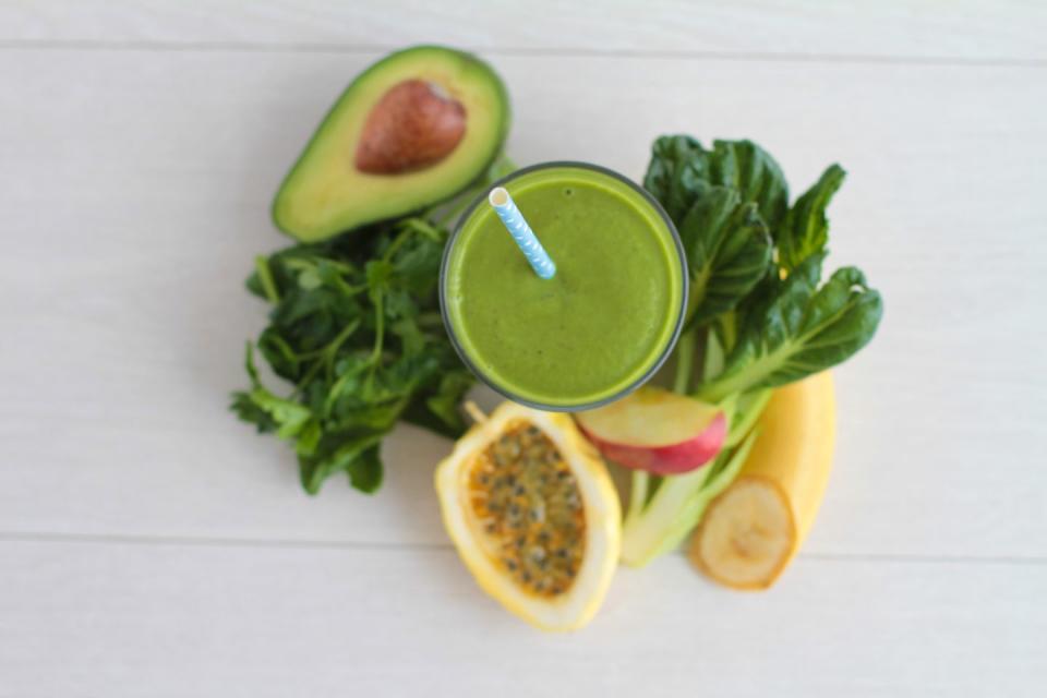 <p>If you're really trying to mask the taste of greens, but want the benefits of them, then try throwing them into a sweet smoothie or green juice. When something like spinach or kale is blended with a variety of fruits and a nut milk, you can't even taste that it's in there. This is a great way to get your vegetables in while consuming something delicious. </p>