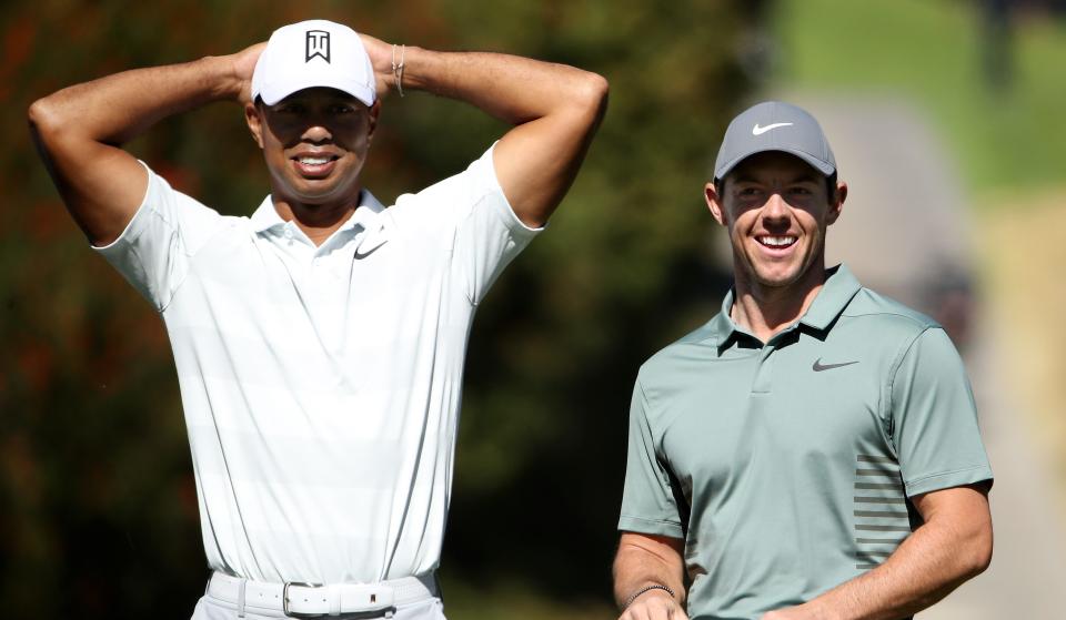 PACIFIC PALISADES, CA - FEBRUARY 16: Tiger Woods and Rory McIlroy of Northern Ireland meet at the fourth tee during the second round of the Genesis Open at Riviera Country Club on February 16, 2018 in Pacific Palisades, California. (Photo by Christian Petersen/Getty Images)