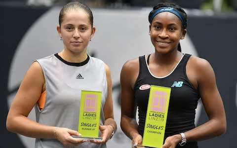 Jelena Ostapenko of Latvia (L) and winner Cori Gauff  - Credit: afp