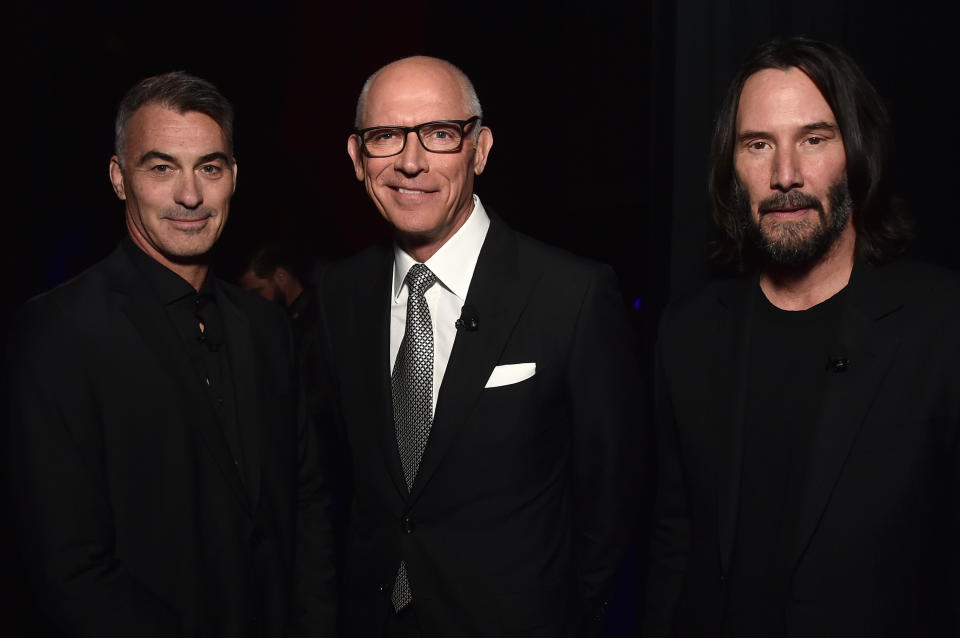 LAS VEGAS, NEVADA - APRIL 28: (L-R) Chad Stahelski, Joe Drake, Chairman, Motion Picture Group, and Keanu Reeves attend CinemaCon 2022 - Lionsgate Invites You to An Exclusive Presentation of its Upcoming Slate at The Colosseum at Caesars Palace during CinemaCon, the official convention of the National Association of Theatre Owners, on April 28, 2022, in Las Vegas, Nevada. (Photo by Alberto E. Rodriguez/Getty Images for CinemaCon)