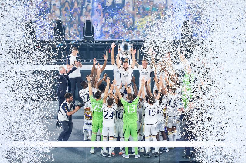 Nacho Fernandez of Real Madrid celebrates with Trophy at Santiago Bernabeu during Real Madrid UEFA Champions League Trophy Parade on June 02, 2024 in Madrid, Spain.