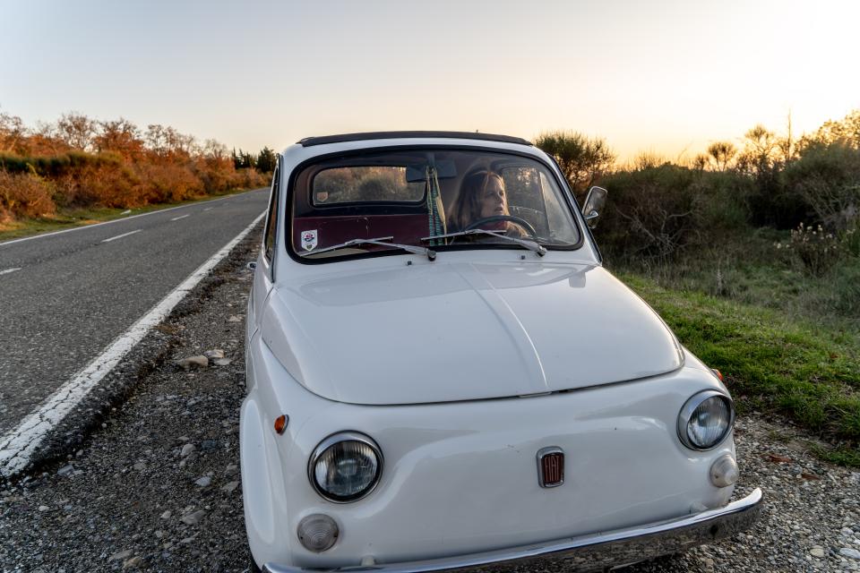 Lynda Albertson in her car, outside of Florence, en route to the tombs of Baditaccia near Rome.