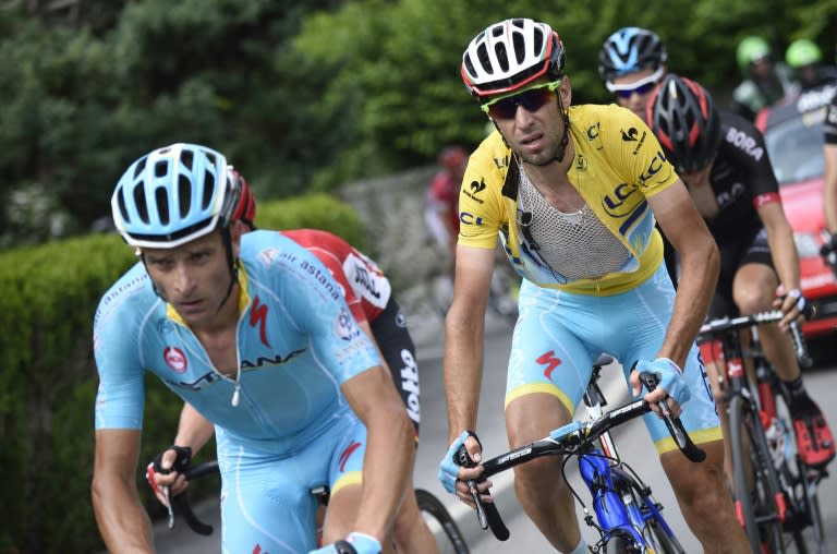 Italy's Vincenzo Nibali, whose Astana team is marred in a doping-related scandal, seen hear wearing the overall leader's yellow jersey in the Dauphine Criterium race on June 13, 2015