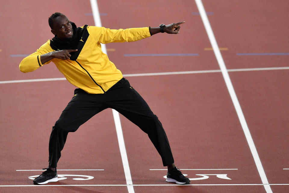 Jamaica’s Usain Bolt preforms his trademark pose during a victory lap at the World Athletics Championships in London Sunday, Aug. 13, 2017. (AP Photo/Martin Meissner)