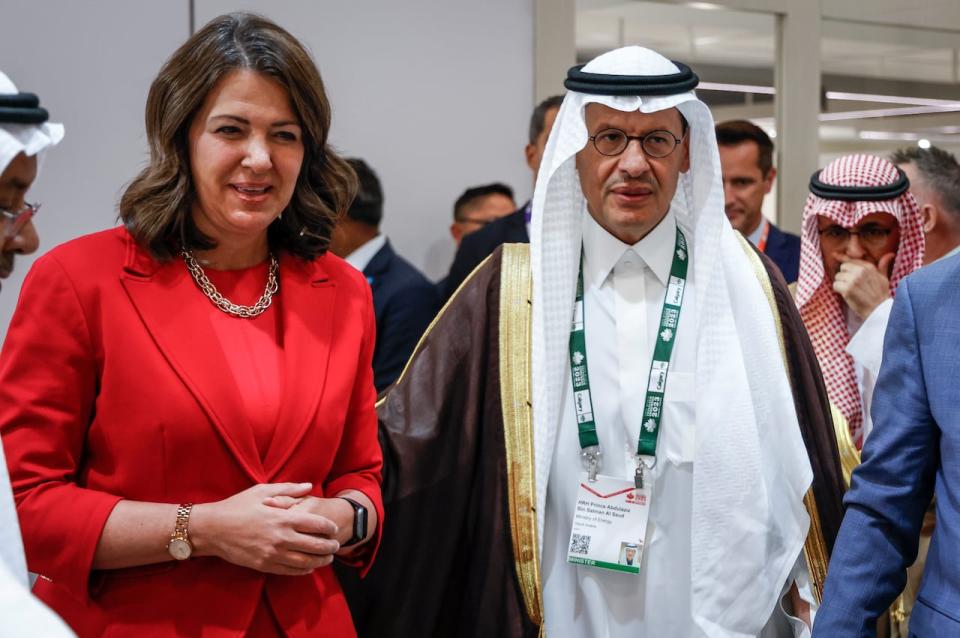 Alberta Premier Danielle Smith, left, tours the Saudi Arabia pavilion with Saudi Arabia Minister of Energy, Abdulaziz bin Salman Al Saud at the World Petroleum Congress in Calgary on Sept. 18.