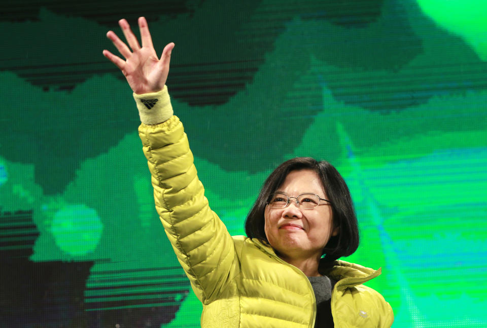 FILE - In this Jan. 2, 2016, file photo, Taiwan's opposition Democratic Progress Party then-presidential candidate Tsai Ing-wen waves to supporters during a campaign rally in the northern coastal town of Tamshui, Taiwan. The residents of this self-governing island are supporting their president Tsai as she stands up to China’s calls for unification with the mainland. (AP Photo/Chiang Ying-ying, File)