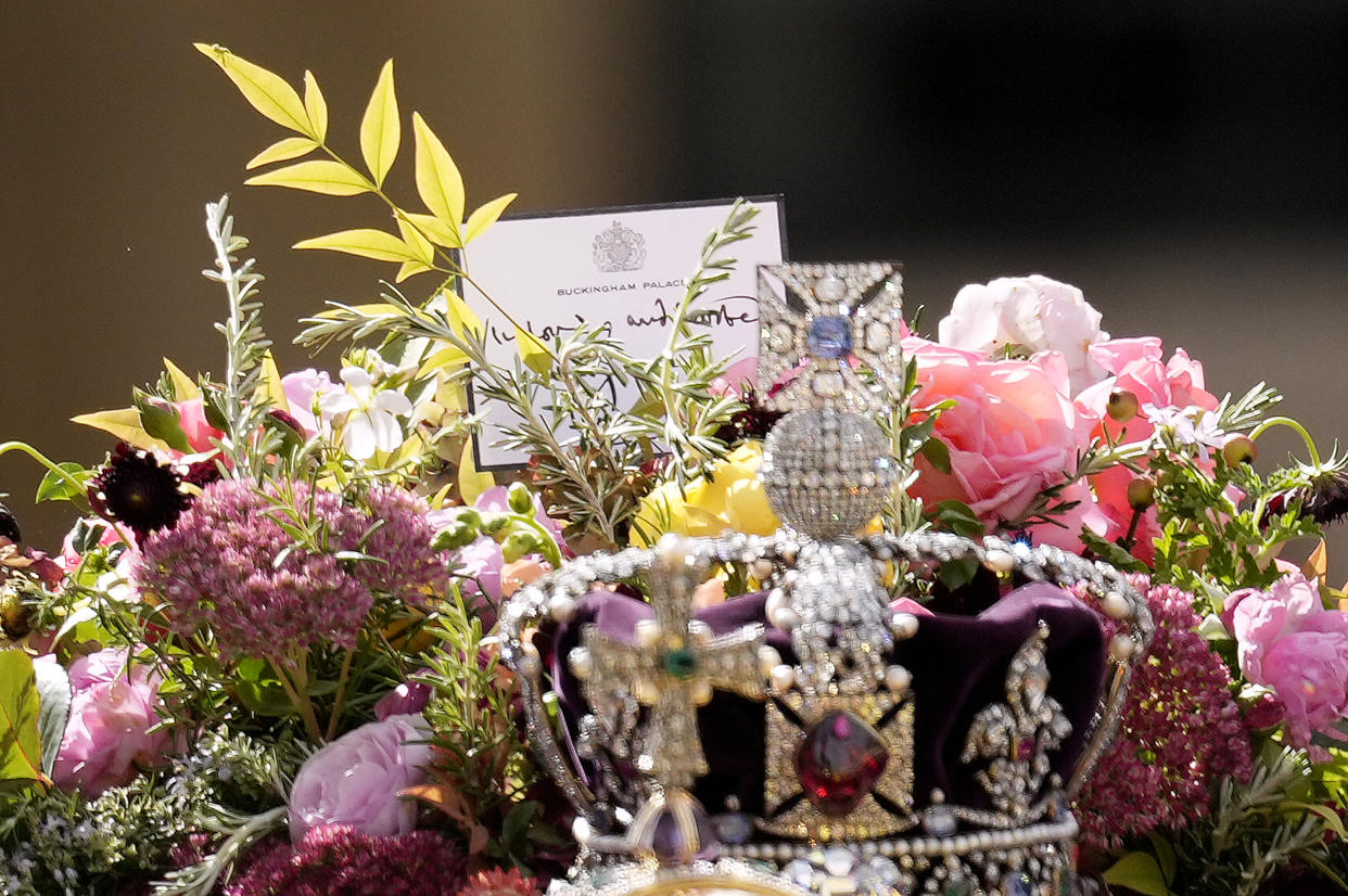 The coffin of Queen Elizabeth II with the Imperial State Crown resting on top is carried by the Bearer Party as it departs Westminster Abbey during the State Funeral of Queen Elizabeth II on September 19, 2022 in London, England. Elizabeth Alexandra Mary Windsor was born in Bruton Street, Mayfair, London on 21 April 1926. She married Prince Philip in 1947 and ascended the throne of the United Kingdom and Commonwealth on 6 February 1952 after the death of her Father, King George VI. Queen Elizabeth II died at Balmoral Castle in Scotland on September 8, 2022, and is succeeded by her eldest son, King Charles III.  (Photo by Christopher Furlong/Getty Images)