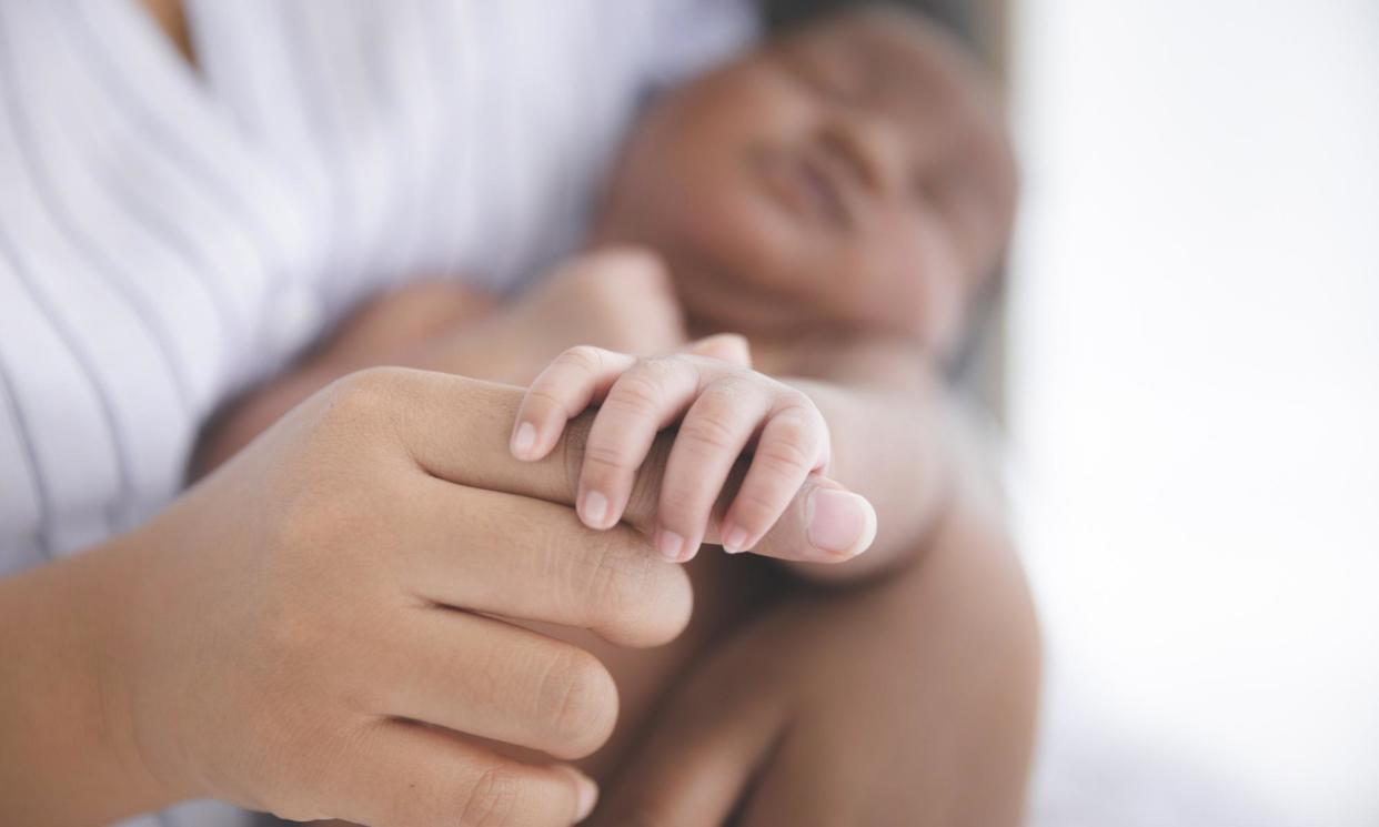 <span>A Guardian analysis has shown that new black mothers are over twice as likely to be admitted to hospital with perinatal mental illness than their white counterparts.</span><span>Photograph: x-reflexnaja/Getty Images</span>