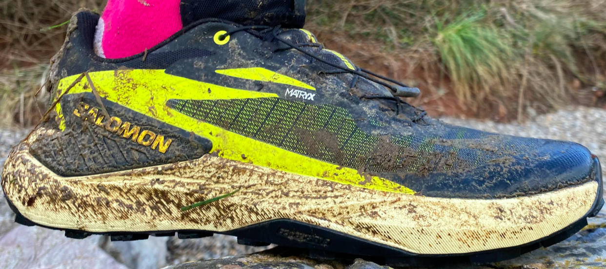  Salomon Genesis trail running shoes muddy. 