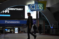 People walk through the Las Vegas Convention Center during setup ahead of the CES tech show Saturday, Jan. 6, 2024, in Las Vegas. (AP Photo/John Locher)