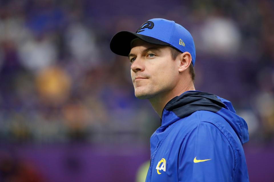 Los Angeles Rams Offensive Coordinator Kevin O'Connell walks on the field before an NFL football game against the Minnesota Vikings, Sunday, Dec. 26, 2021, in Minneapolis.