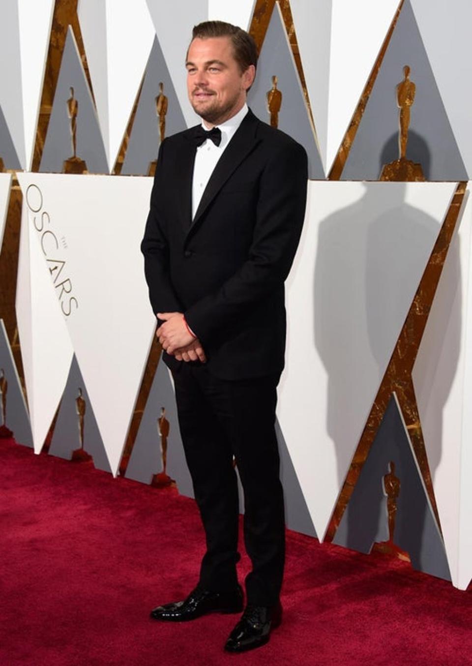 Leonardo DiCaprio wore Giorgio Armani made to measure for the 88th Academy Awards. On the night, the actor won the Best Actor award for his leading role in 'The Revenant'. (Getty)