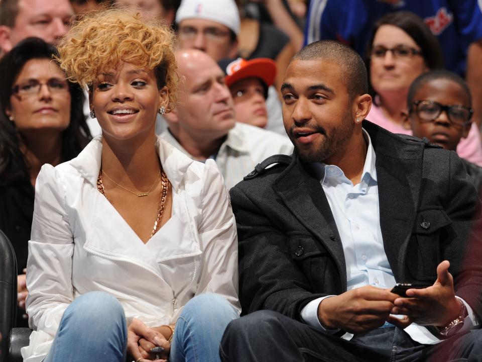 Rihanna and Los Angeles Dodgers player Matt Kemp attend a game between the Cleveland Cavaliers and the Los Angeles Clippers at Staples Center on January 16, 2010 in Los Angeles, California