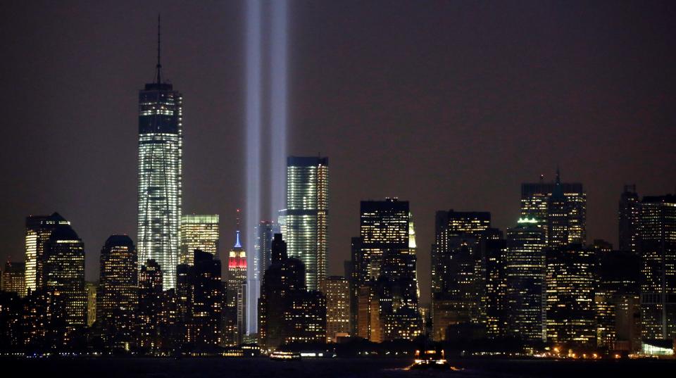 In this Sept. 11, 2013, file photo, the twin beams of the annual Tribute in Light commemorating the Sept. 11, 2001, terrorist attacks shine amid the city's skyline, in New York.