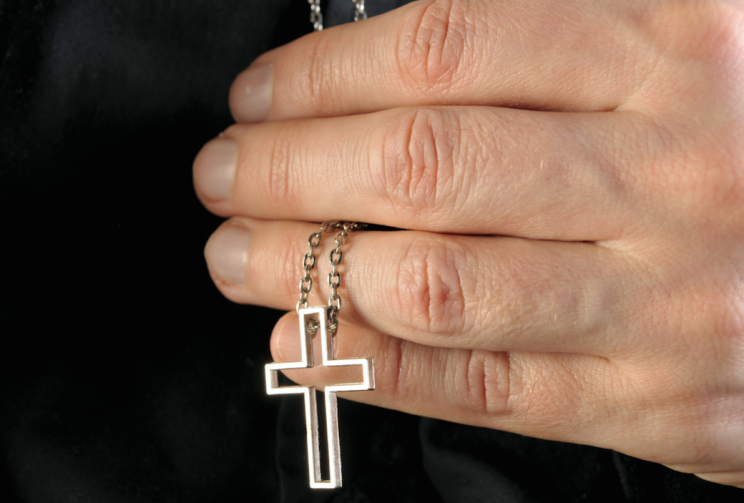 Religious symbols such as the Christian cross can also be banned (Picture: Rex)