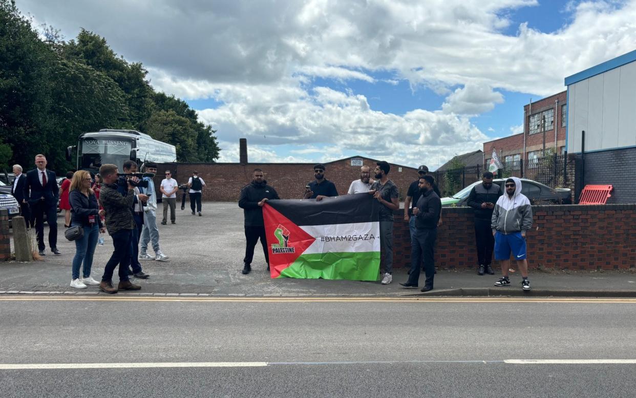 The protesters held a banner with the words 'free Palestine' and '#BHAM2GAZA'