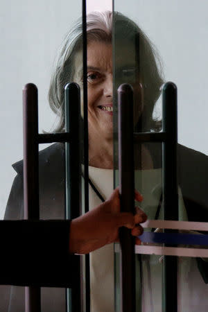 Brazil's Supreme Court President Carmen Lucia smiles before a session of the Supreme Court, in Brasilia, Brazil March 21, 2018. REUTERS/Ueslei Marcelino