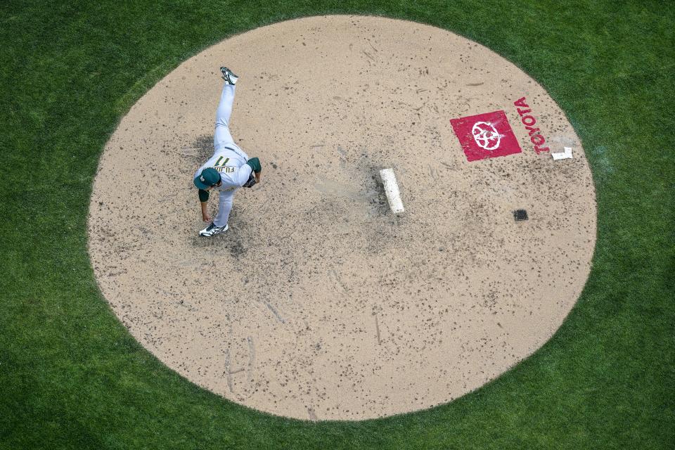 Oakland Athletics relief pitcher Shintaro Fujinami throws during the ninth inning of a baseball game against the Milwaukee Brewers Saturday, June 10, 2023, in Milwaukee. (AP Photo/Morry Gash)