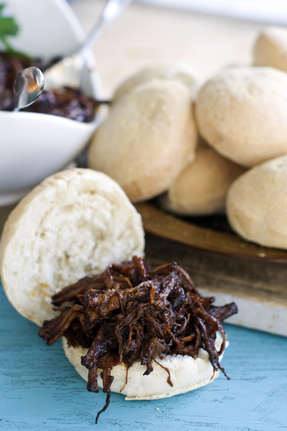 In this image taken on Nov. 12, 2012, a sweet-and-tangy barbecue brisket slider is shown served on a bun in Concord, N.H. (AP Photo/Matthew Mead)