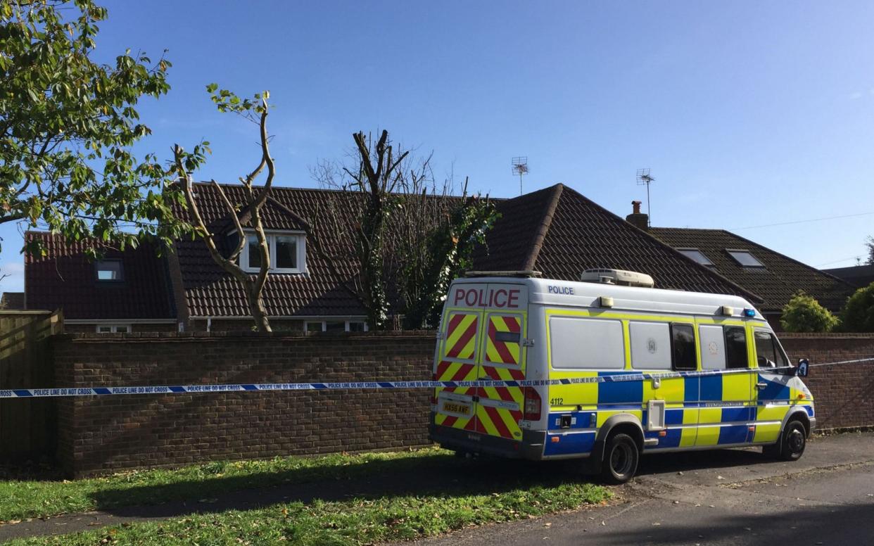 Police at the scene outside a property in Fordingbridge, Hampshire - PA