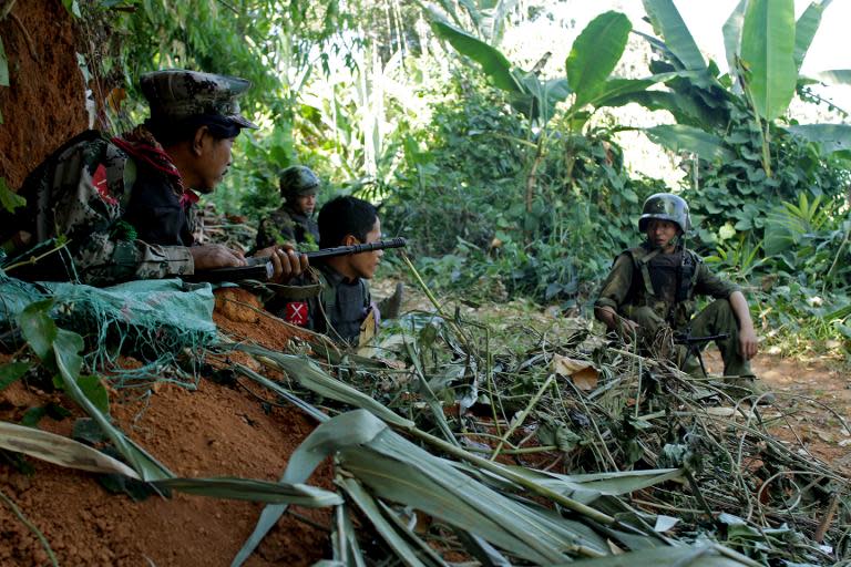 Rebel Kachin Independence Army (KIA) 3rd Brigade soldiers secure an area on Hka Ya mountain in Kachin province, on January 20, 2013