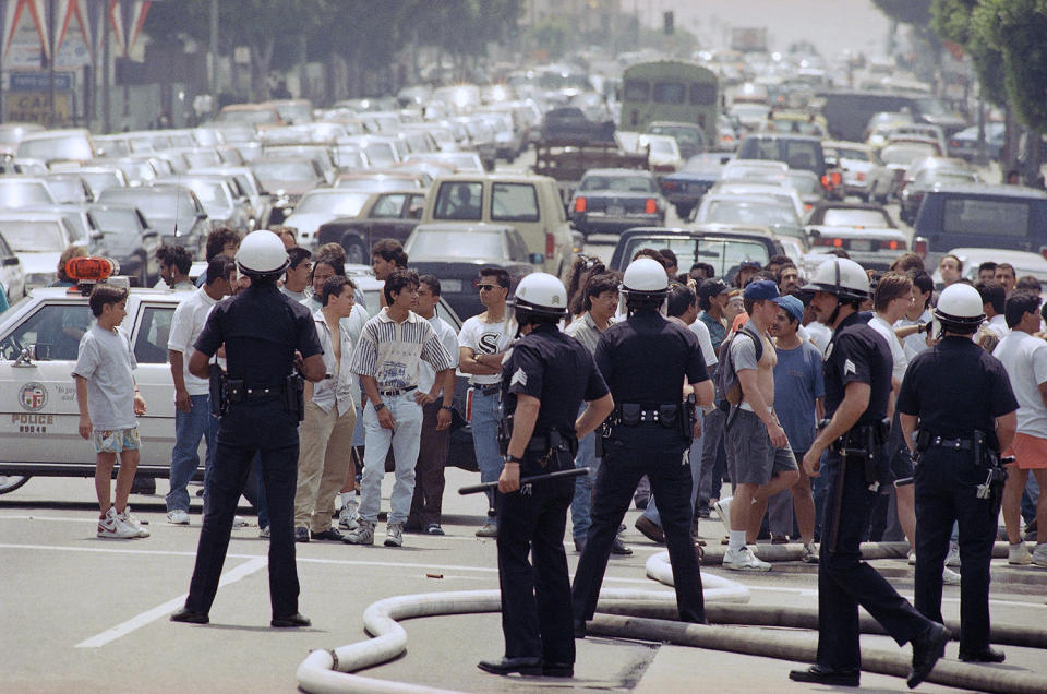 Police officers stopping traffic