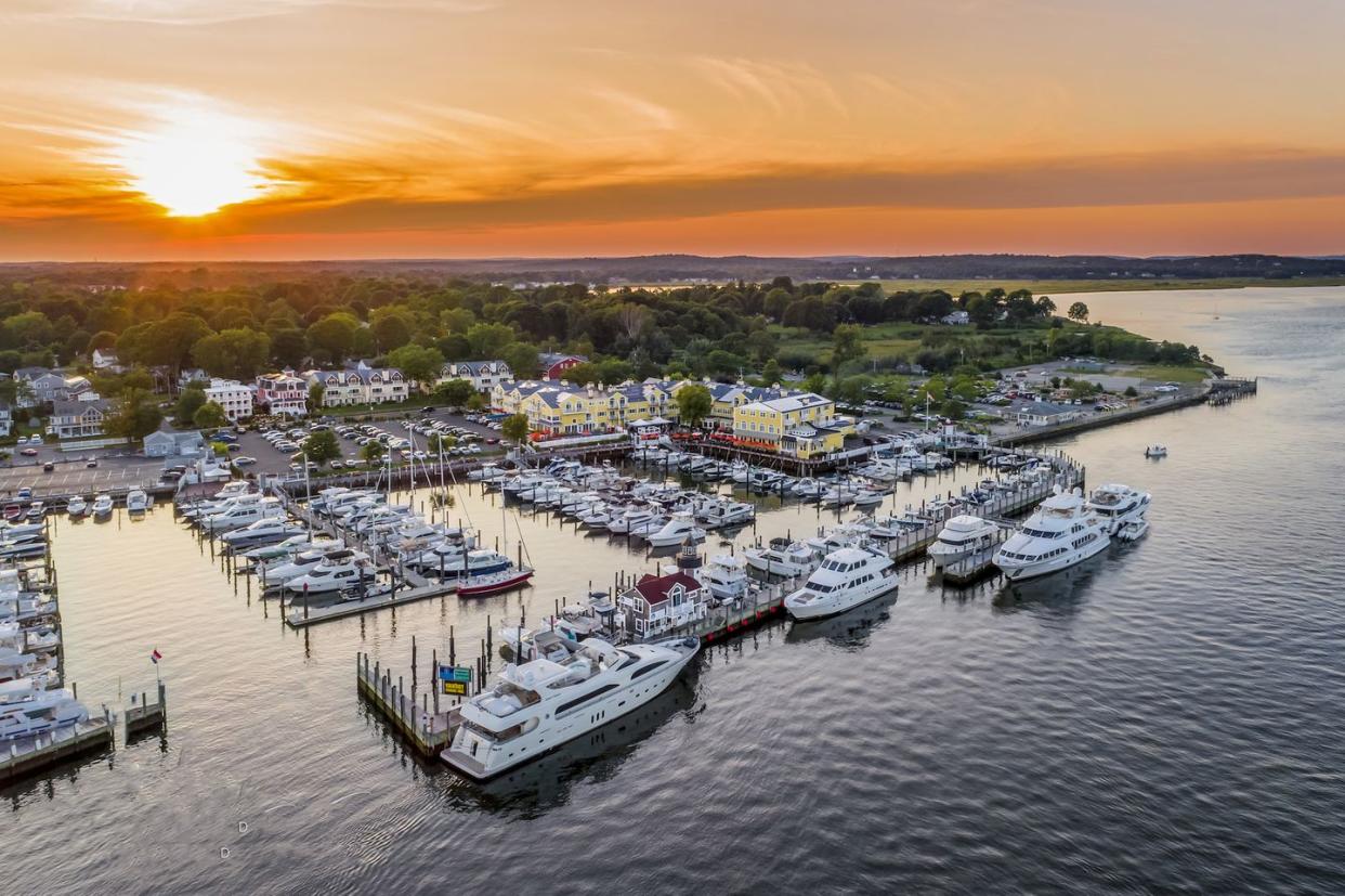 a body of water with boats and buildings along it