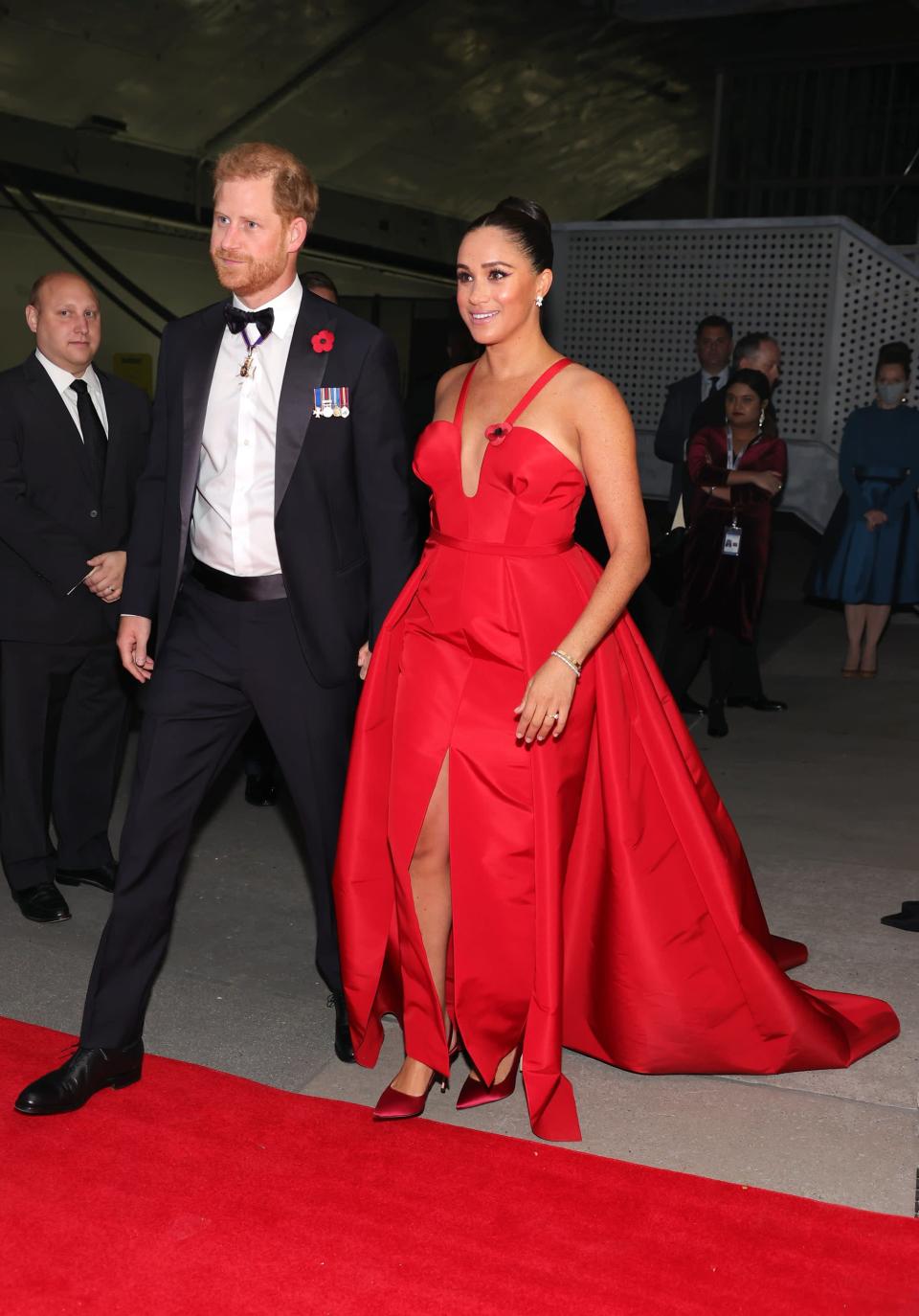 <p>All eyes were on Markle at the 2021 Freedom Gala when she donned a vibrant <a href="https://www.popsugar.com/fashion/meghan-markle-carolina-herrera-red-dress-freedom-gala-48599250" class="link " rel="nofollow noopener" target="_blank" data-ylk="slk:red gown">red gown</a> custom-made by Wes Gordon. The look featured a floor-sweeping train, thigh-high split, and plunging neckline, with Giuseppe Zanotti heels to match.</p>