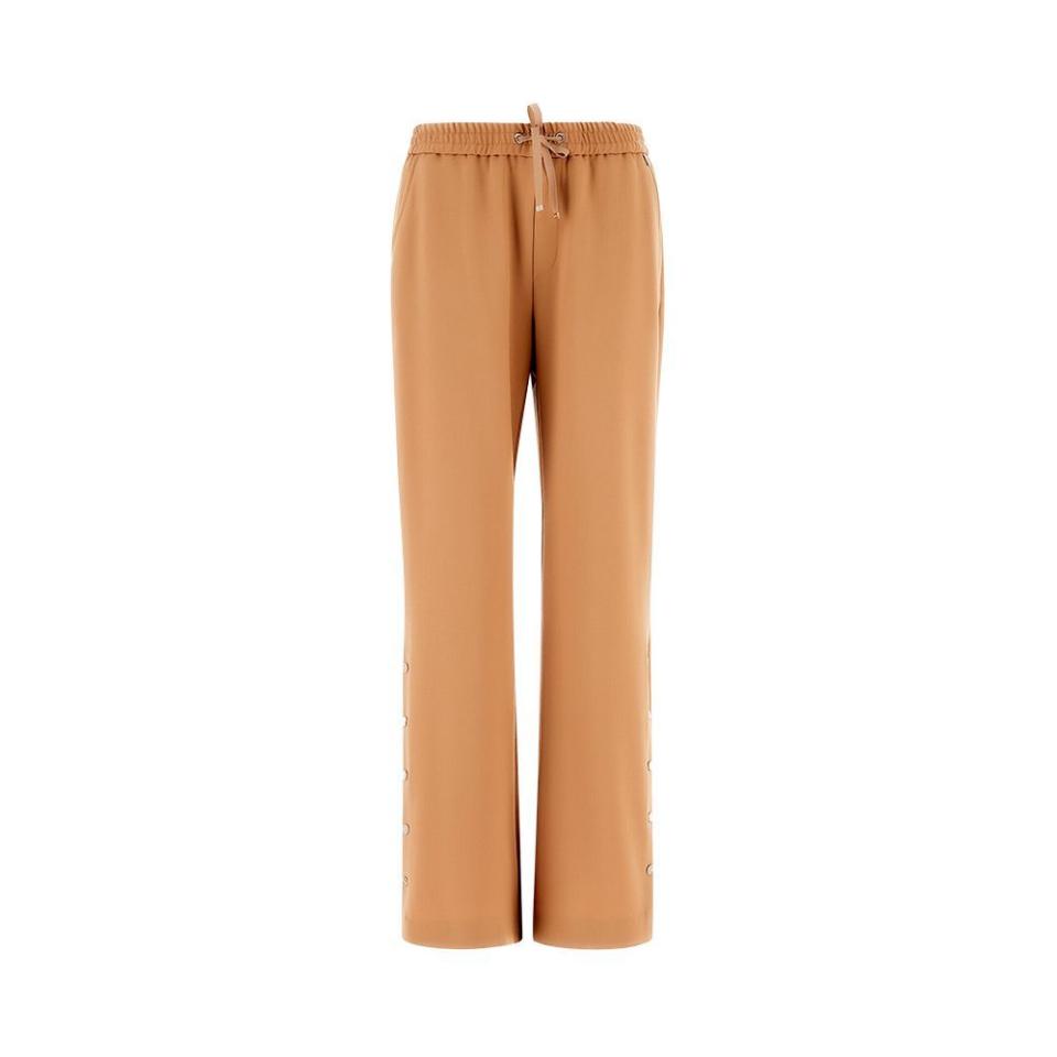 <p><a href="https://us.herno.com/women/clothing/trousers/pantalone-donna-light-wool-stretch-hd-sand-338055721746685.html" rel="nofollow noopener" target="_blank" data-ylk="slk:Shop Now;elm:context_link;itc:0;sec:content-canvas" class="link ">Shop Now</a></p><p>Stretch Trousers</p><p>herno.com</p><p>$396.00</p>